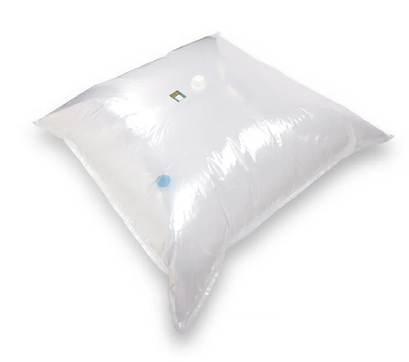 Smart Fluid Pac pillow liner, filled, with top fitment and bottom discharge valve